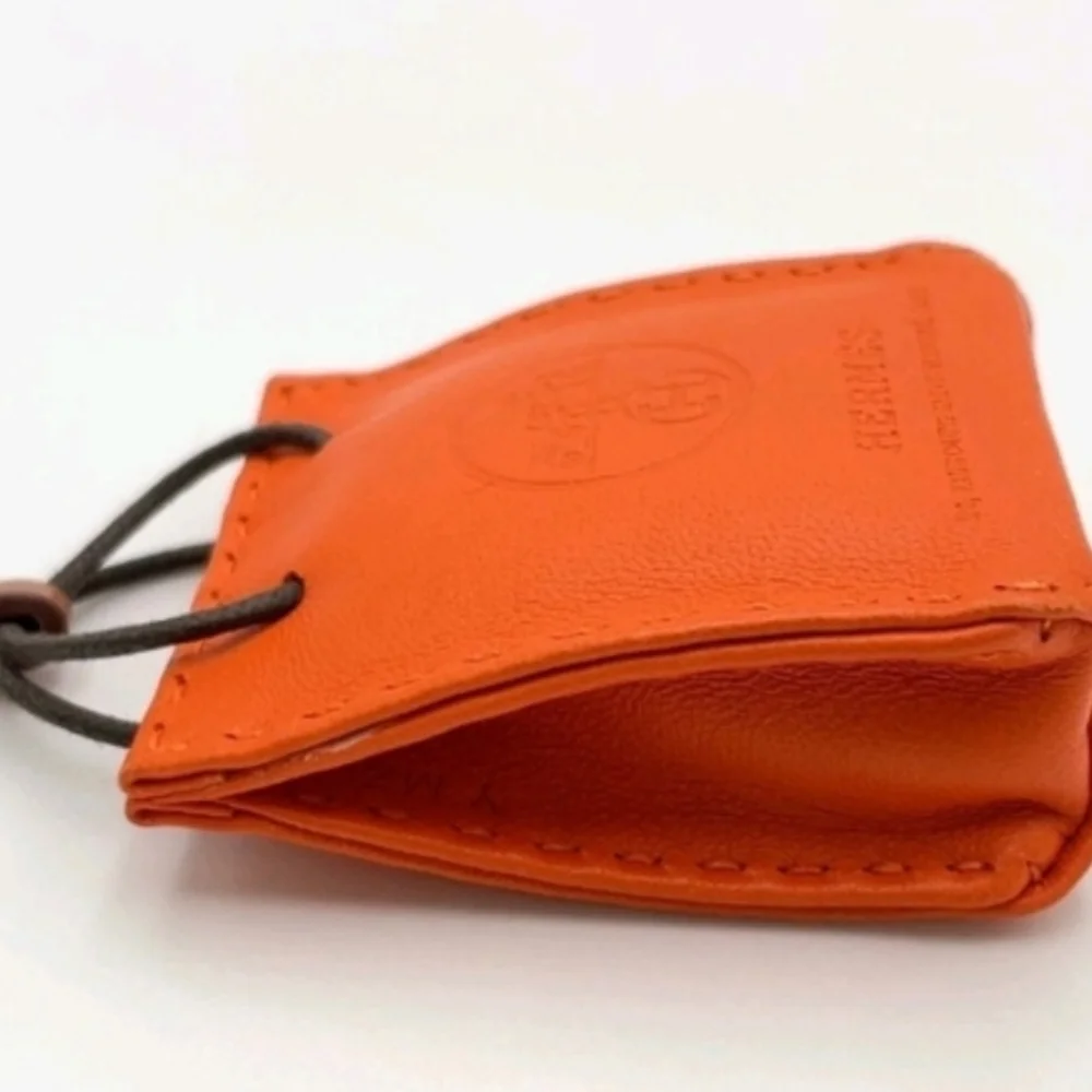 HERMÈS ORANGE LEATHER MINI POUCH BAG CHARM KEY HOLDER + BOX - Picture 9 of 12